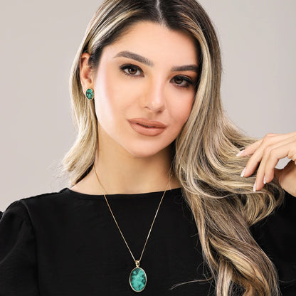 18K gold-plated necklace with oval-shaped emerald gemstone