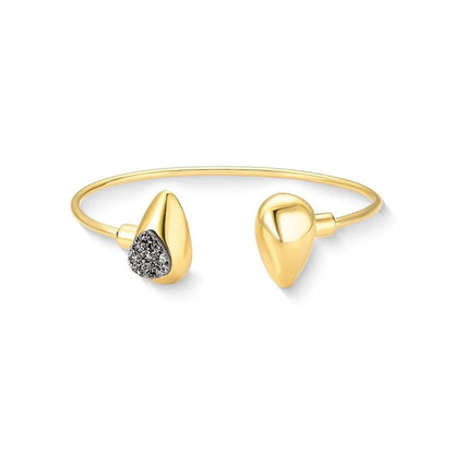 18K gold-plated bangle style bracelet with titanium