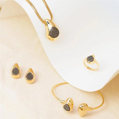 18K gold-plated bangle style bracelet with titanium