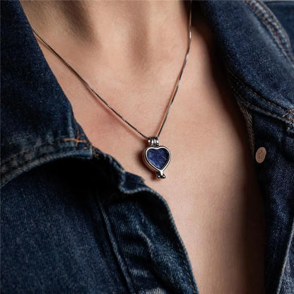 Heart-shaped locket combo necklace with seven natural stone plates