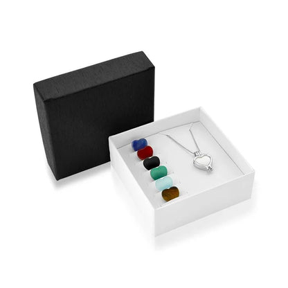 Heart-shaped locket combo necklace with seven natural stone plates