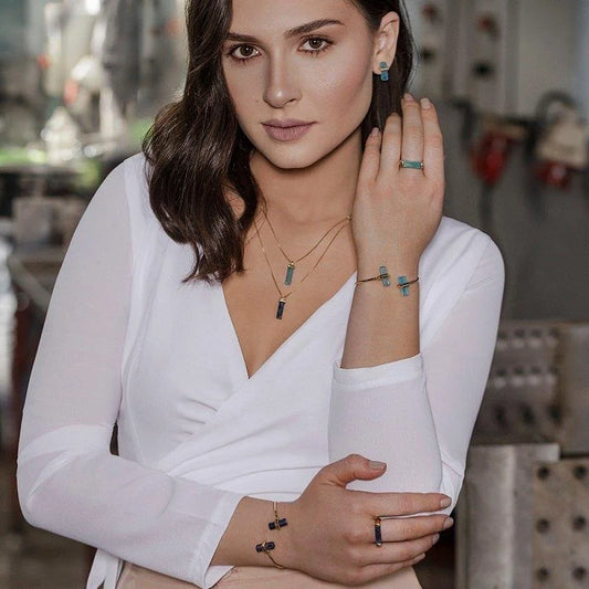 18K Gold-plated set featuring earrings and a pendant